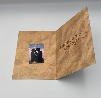 Image of the flashdrive with the episodes set inside a folding card