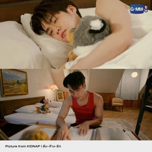 Golden retriver doll being hugged by Q in Kidnap show 